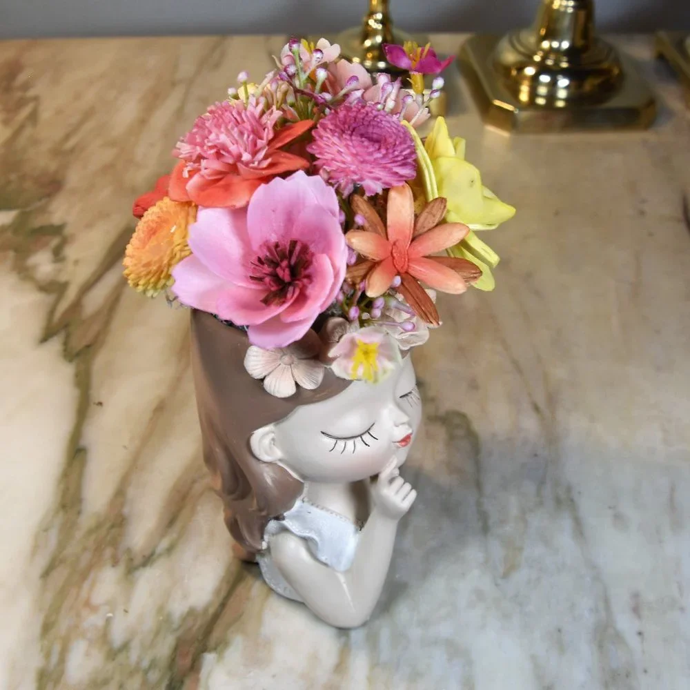 Planter with bright flowers you never water! Molded resin girl-adorable details